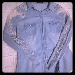 Denim blouse with lace sleeves